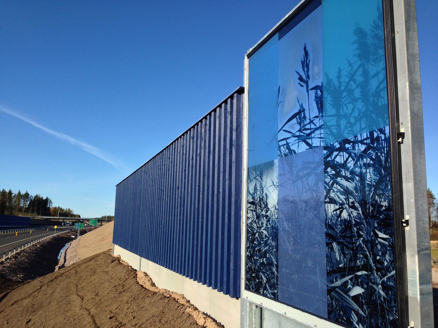 Noise barrier along the highway
