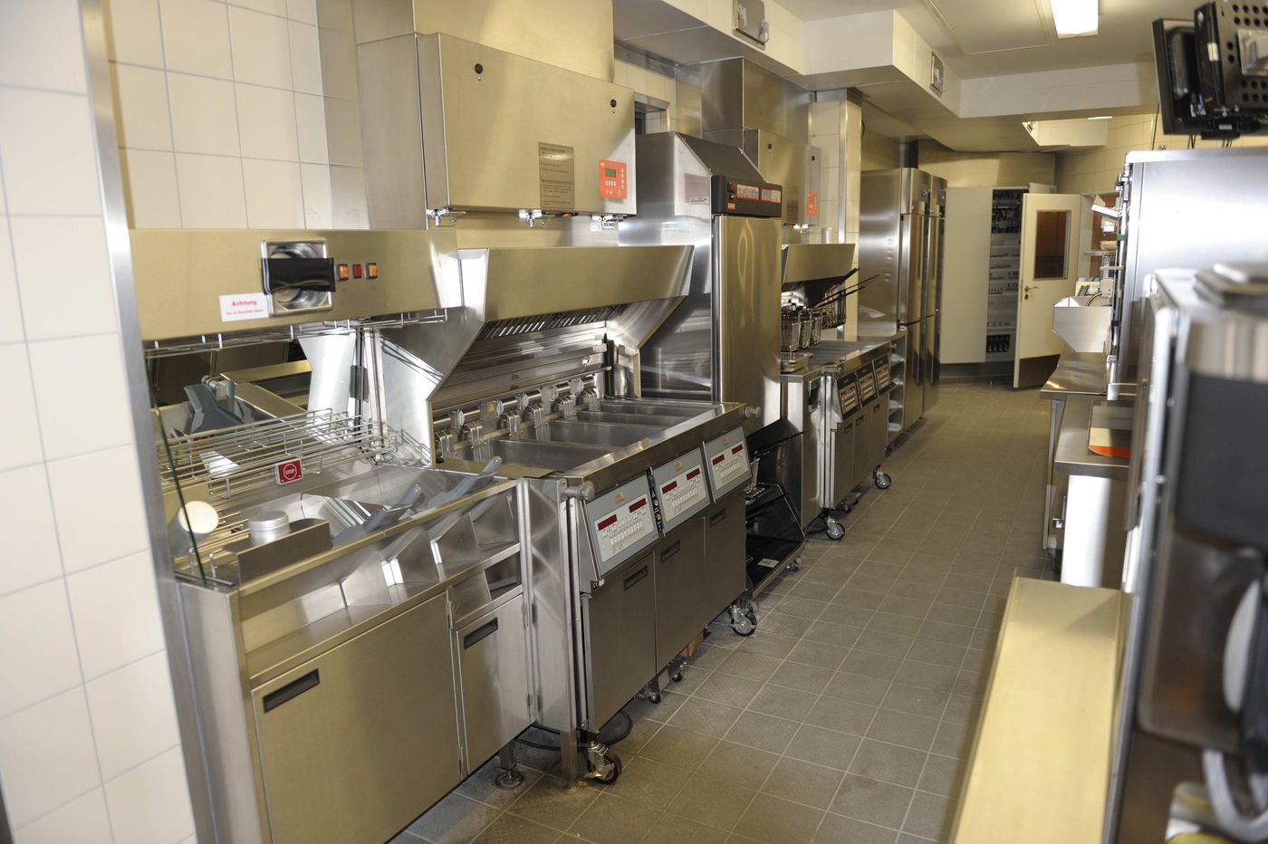 Kitchen line with treated surfaces