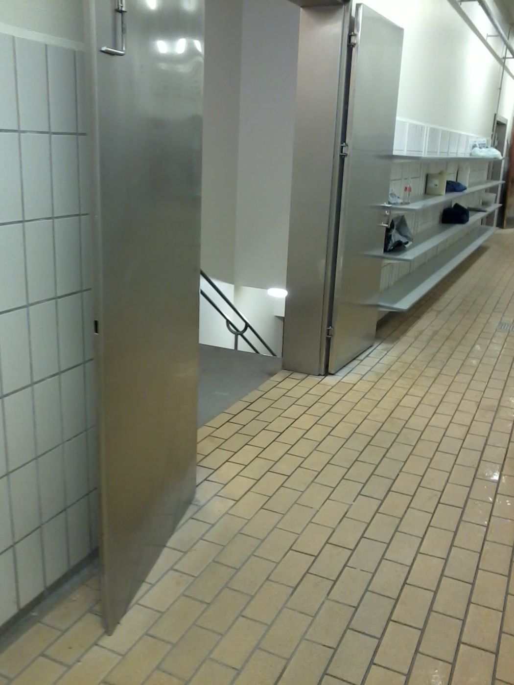 Corridor with coated wall panels